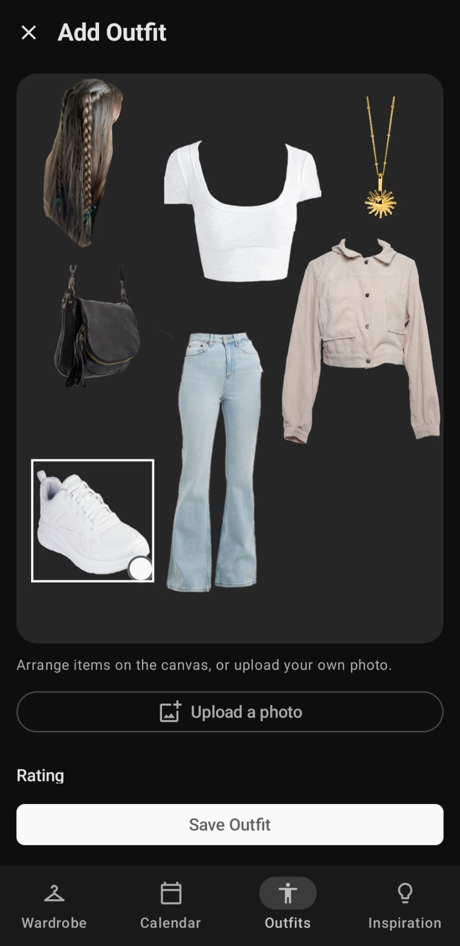 Outfit builder with clothing pieces arranged on a canvas